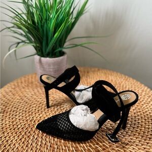 Brand New never worn Antonio Melani Size 7. Black with black crystals